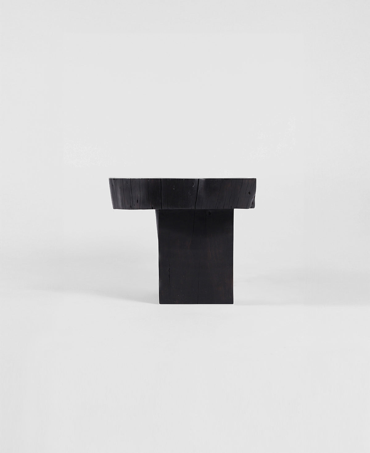 Trunk Seat, three-quarter view, carved timber seat