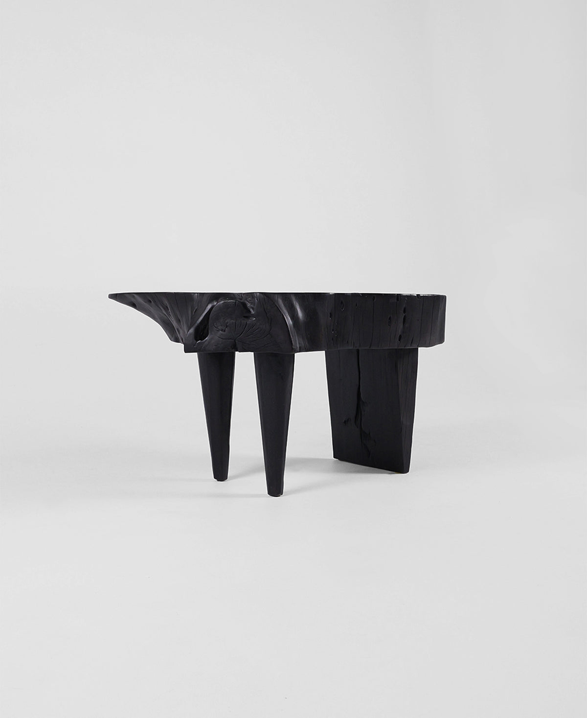 Trunk Seat, side profile view, carved timber seat
