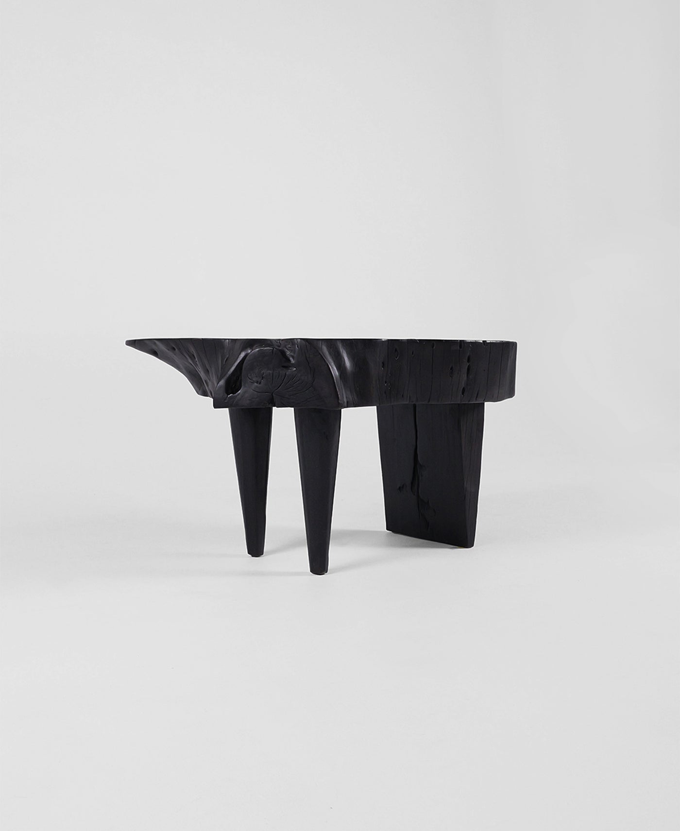 Trunk Seat, side profile view, carved timber seat