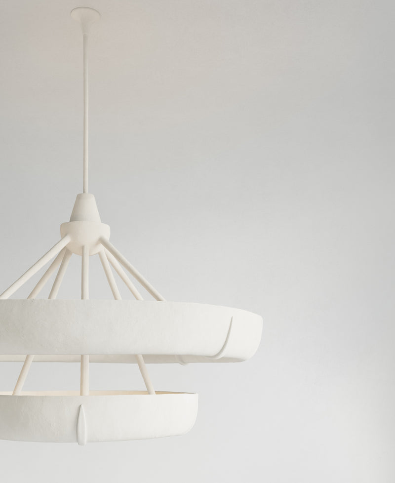 Aura Double Hanging Light, close-up of textured plaster surface