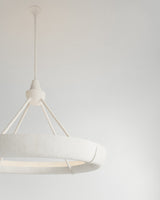 Aura Single Hanging Light, close-up of textured plaster surface