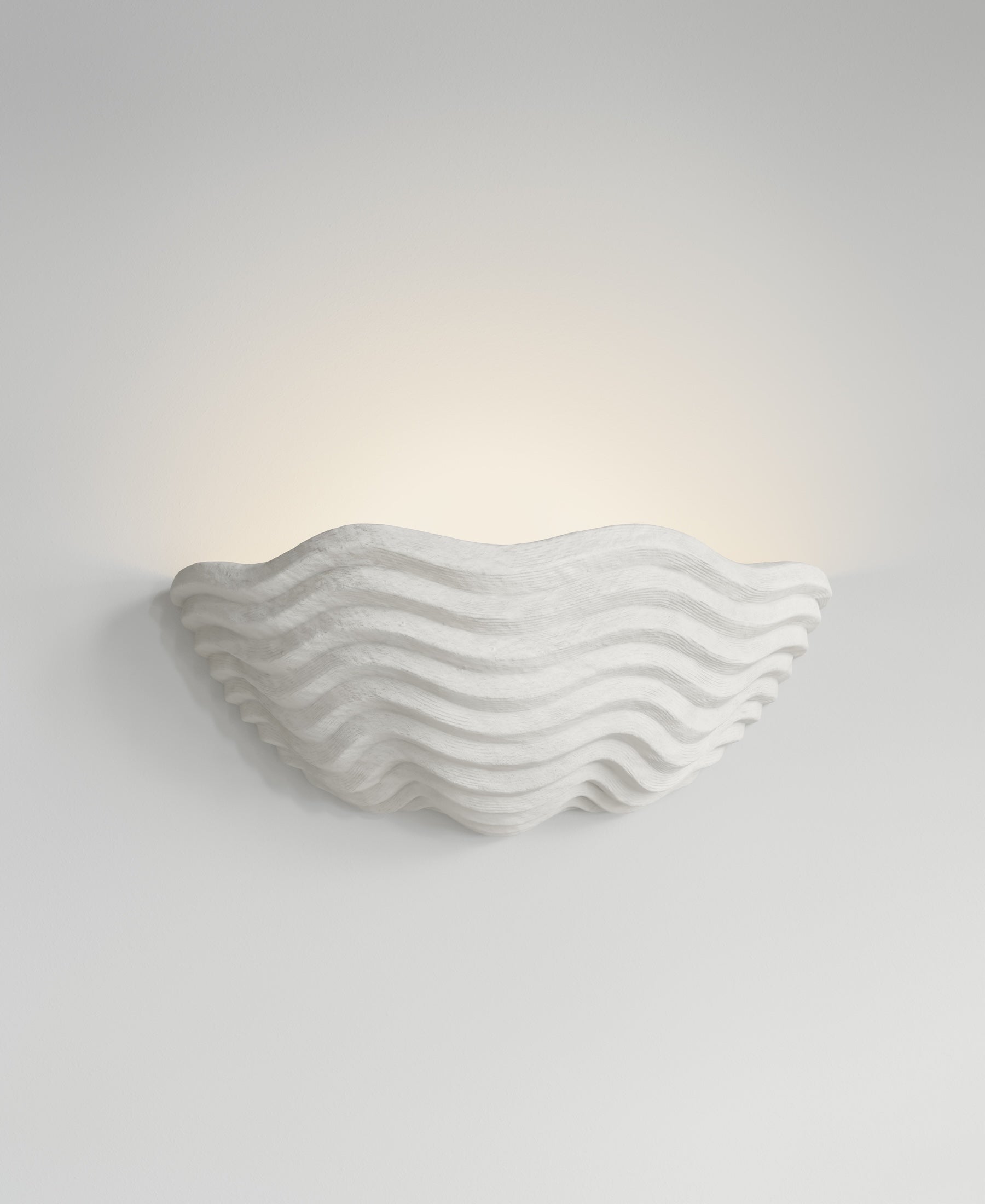 Clam Sconce, light-on view, sculptural resin wall sconce
