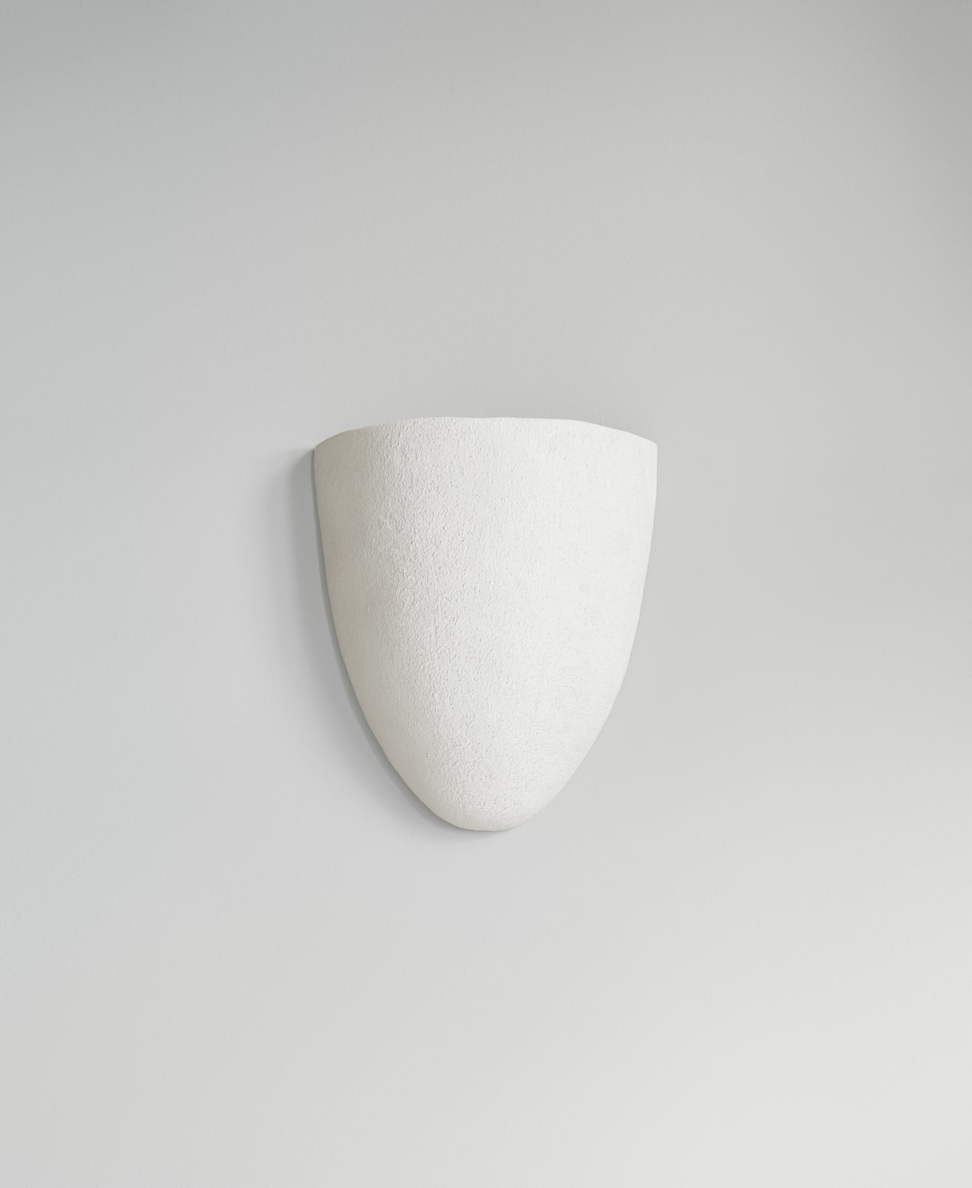 Elce Sconce, front view, sculptural resin wall sconce