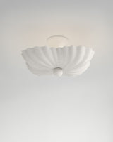 Moreau Hanging Light, light-on view, sculptural resin pendant