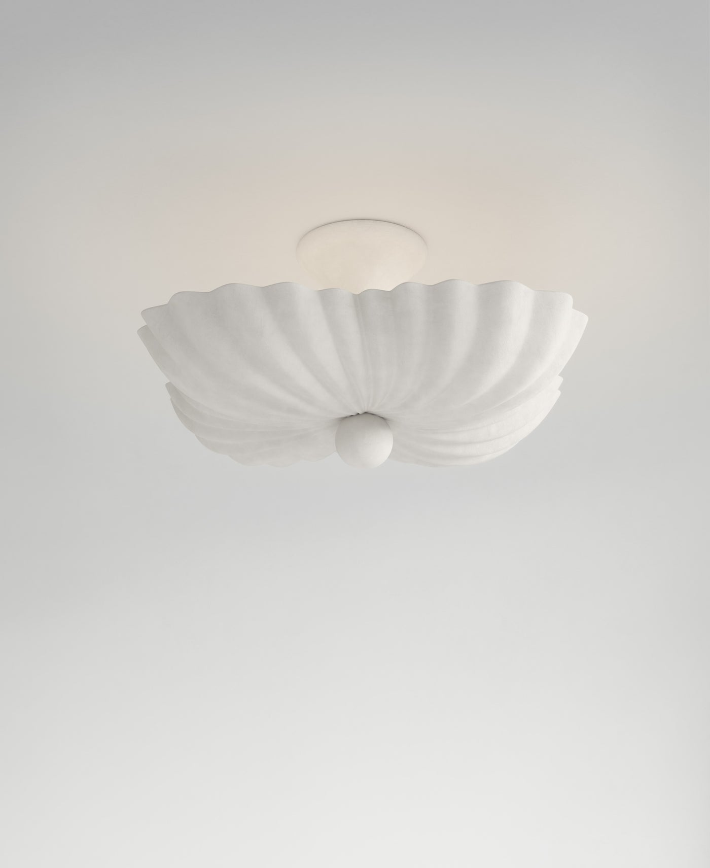 Moreau Hanging Light, light-on view, sculptural resin pendant
