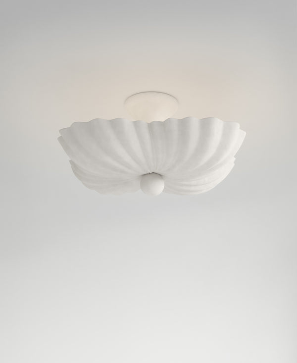 Moreau Hanging Light, light-on view, sculptural resin pendant