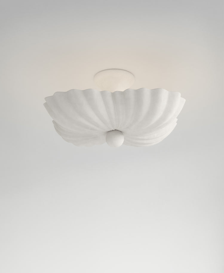 Moreau Hanging Light, light-on view, sculptural resin pendant