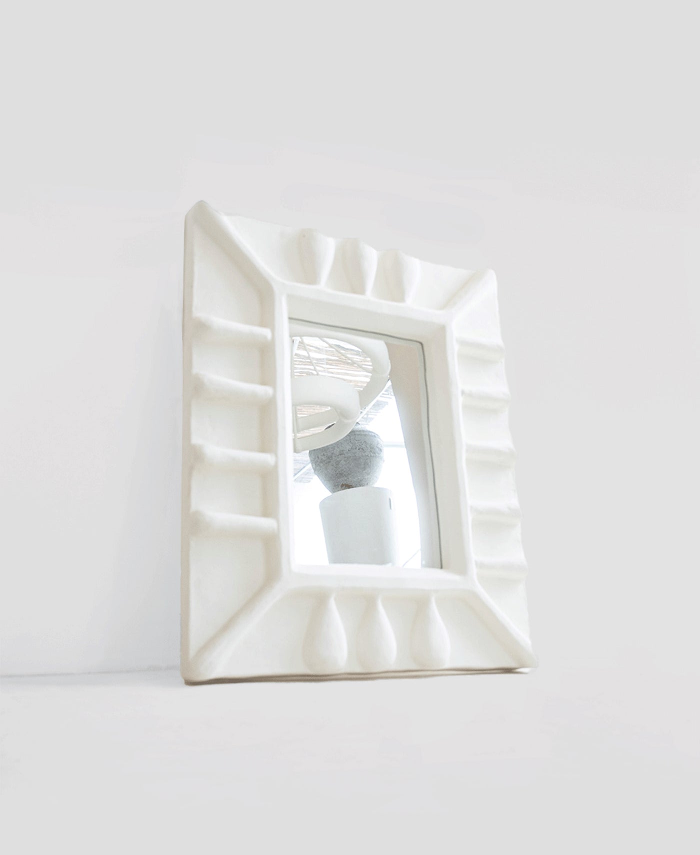 Albini Mirror, front product view, white sculptural plaster mirror