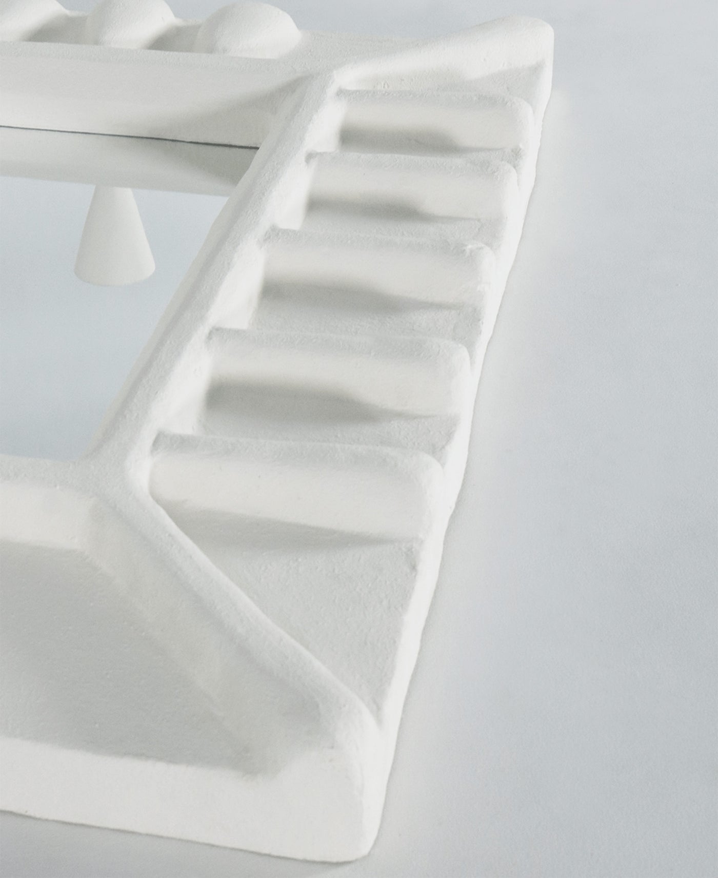 Albini Mirror, angle view two, white sculptural plaster mirror