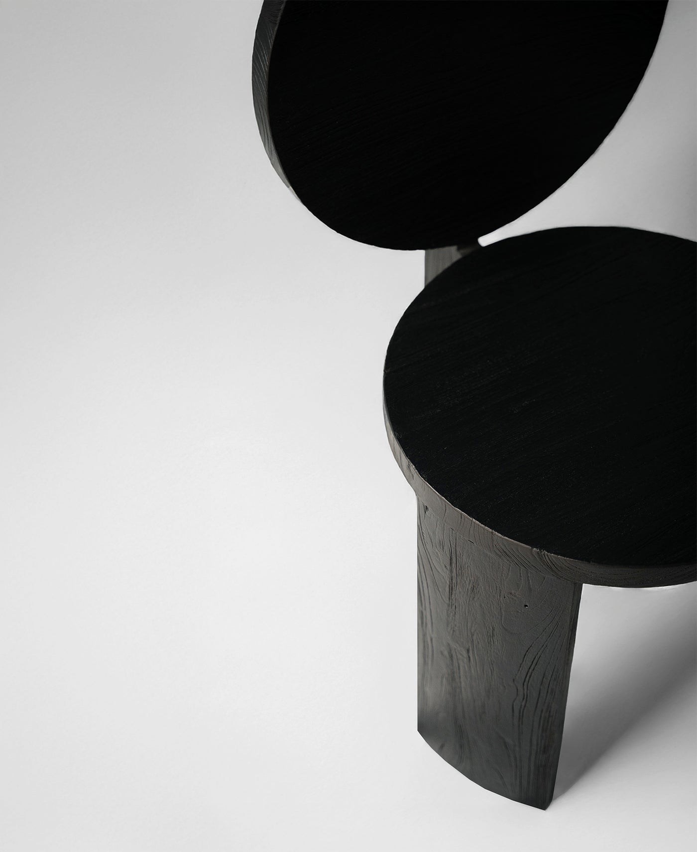 Chair 00, angled view two, black satin teak dining chair