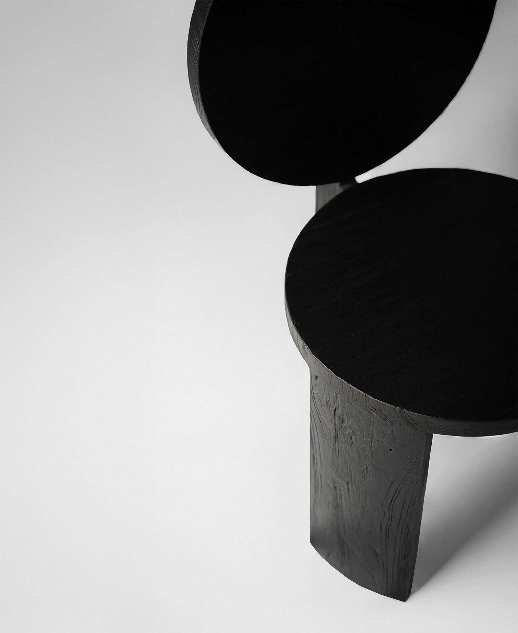 Chair 00, angled view two, black satin teak dining chair