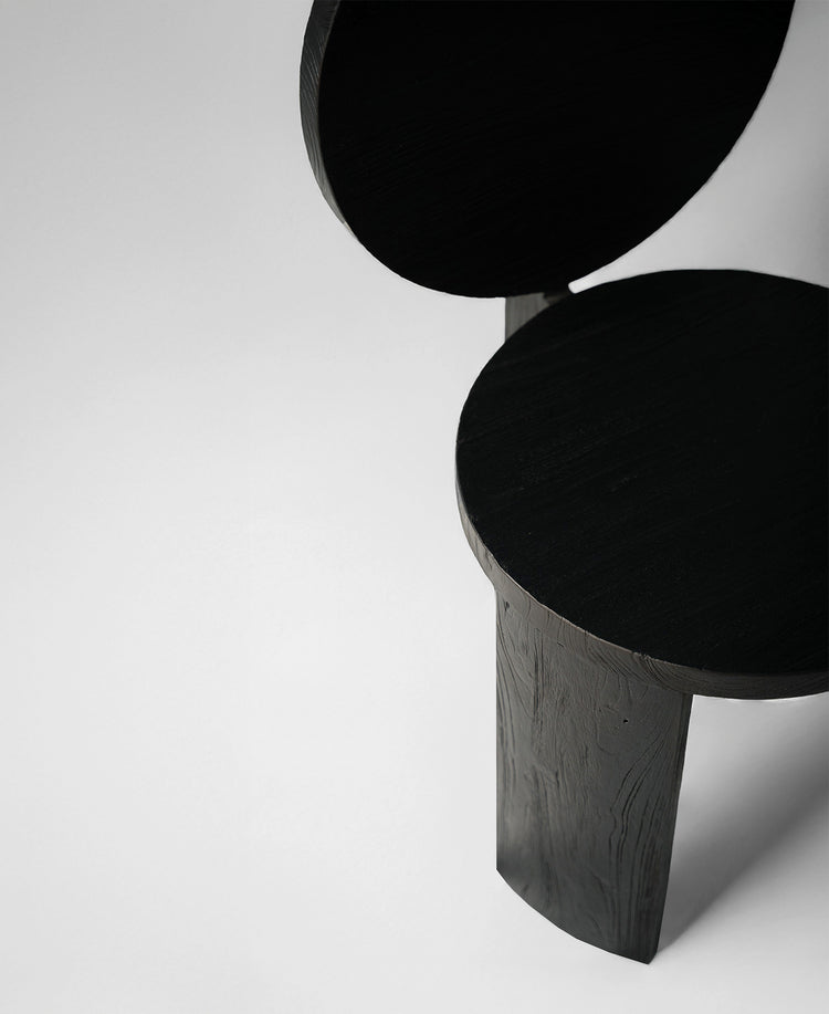 Chair 00, angled view two, black satin teak dining chair
