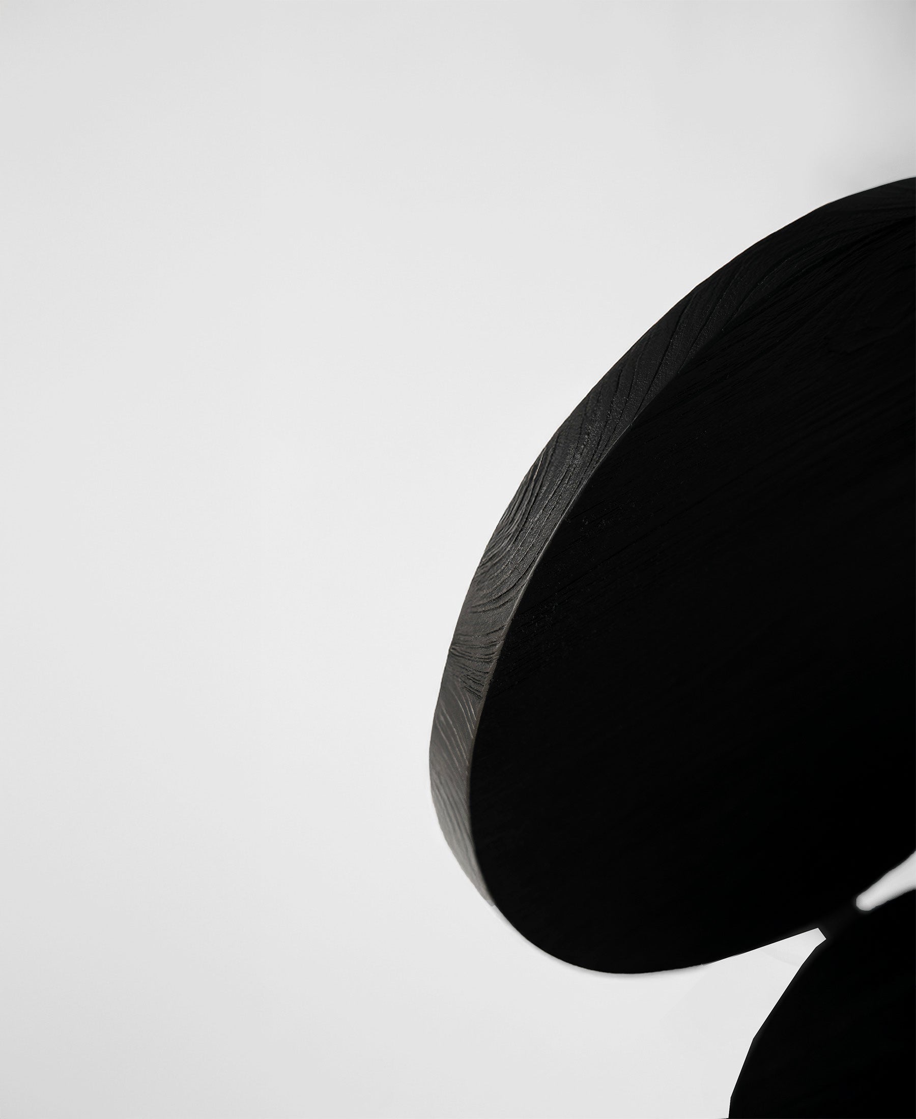 Chair 00, angled view three, black satin teak dining chair