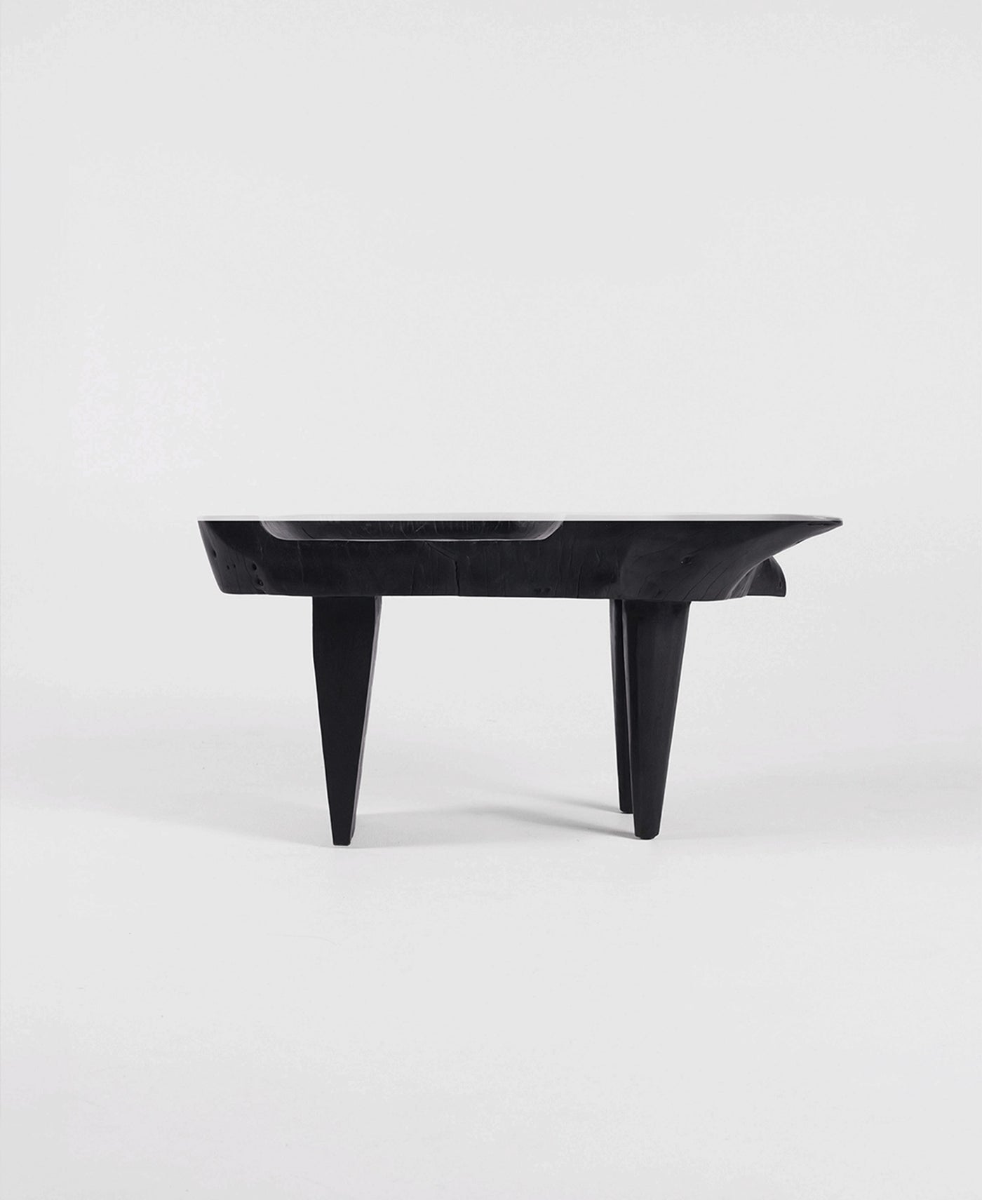 Trunk Seat, angled view, carved timber seat