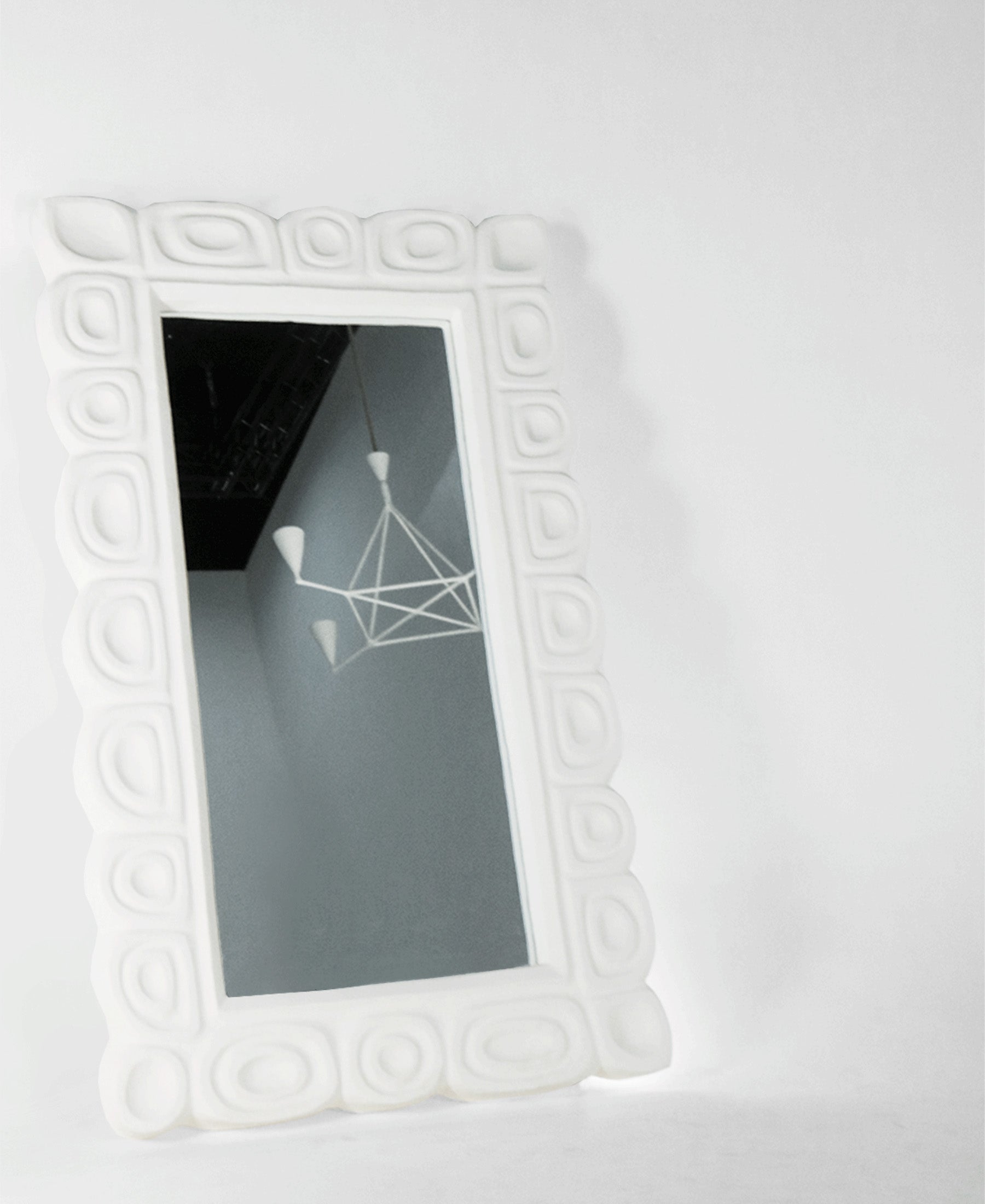 Cocteau Mirror large, front view, carved plaster wall mirror