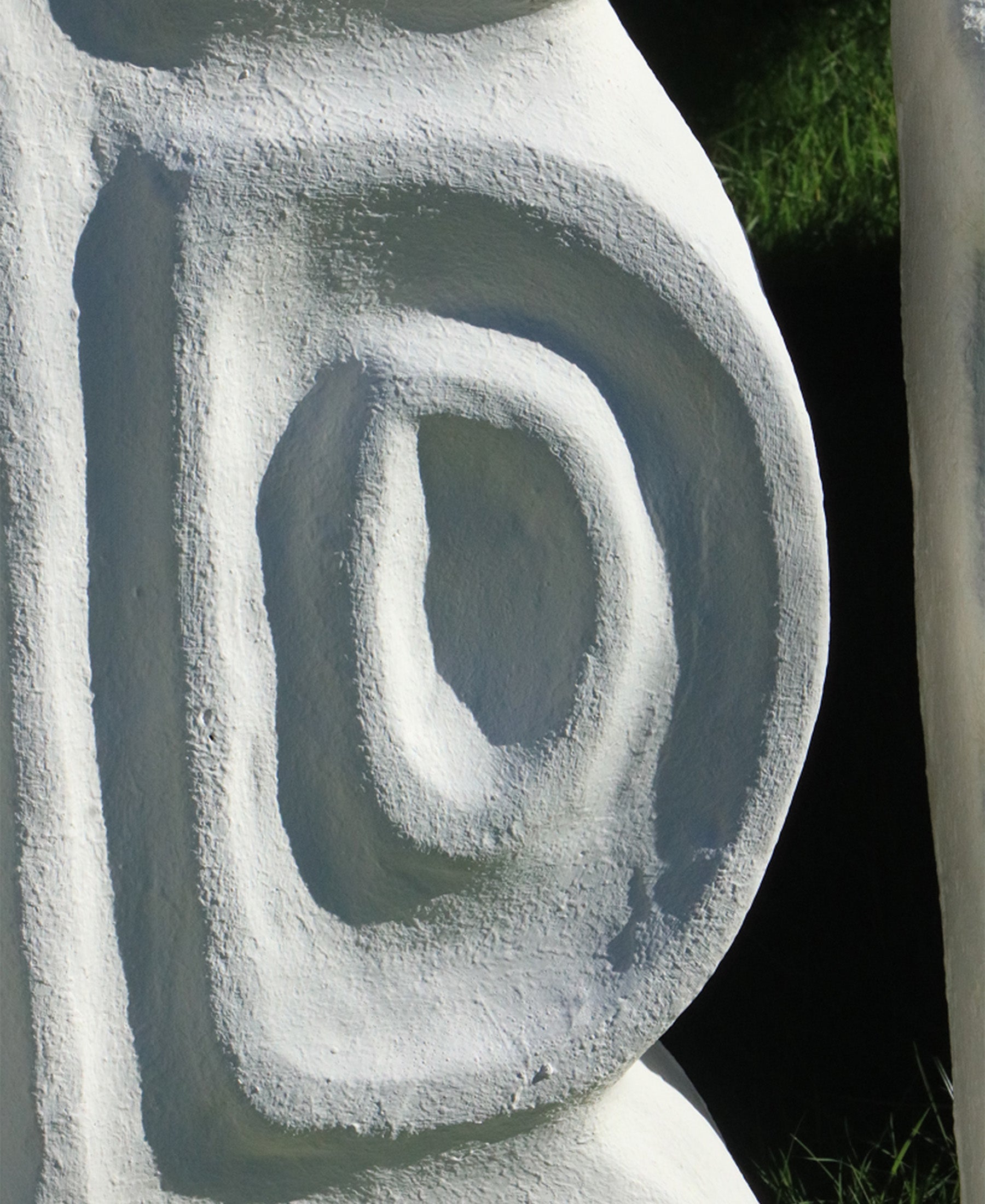 Cocteau Mirror, detail view of carved plaster frame